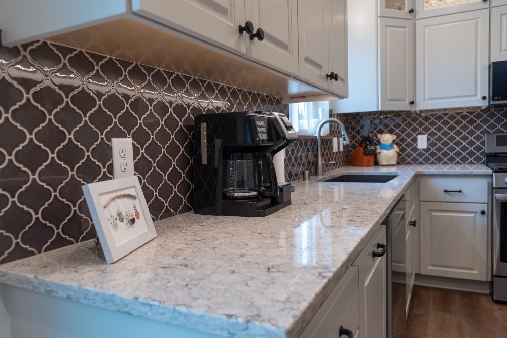 Counterspace and tile backsplash close up 